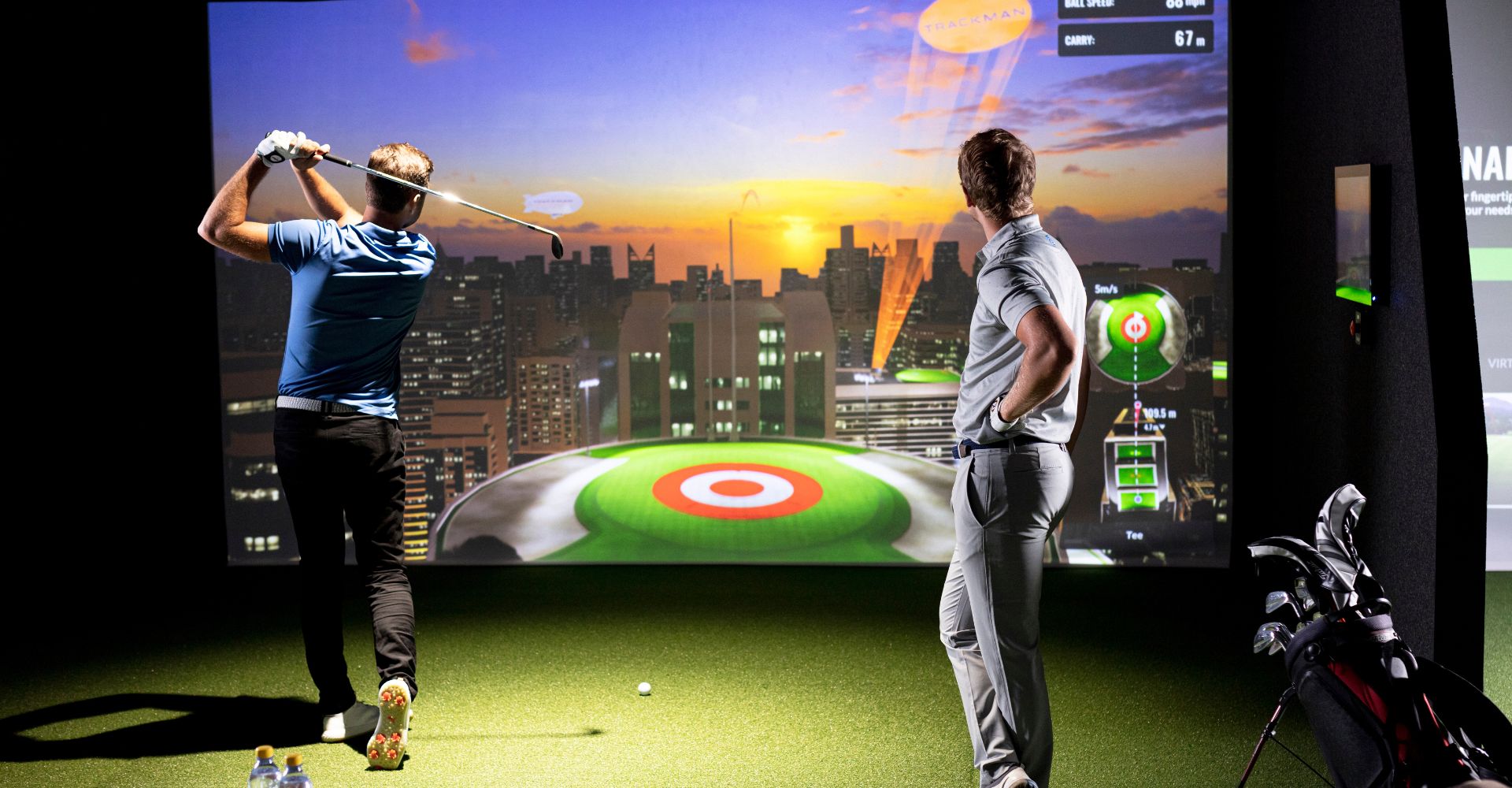 Golfer using TrackMan simulator at InPlay