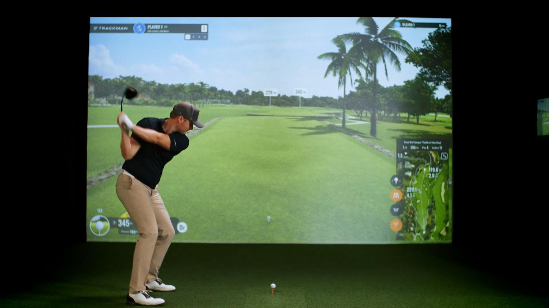 Golfer using TrackMan simulator at InPlay
